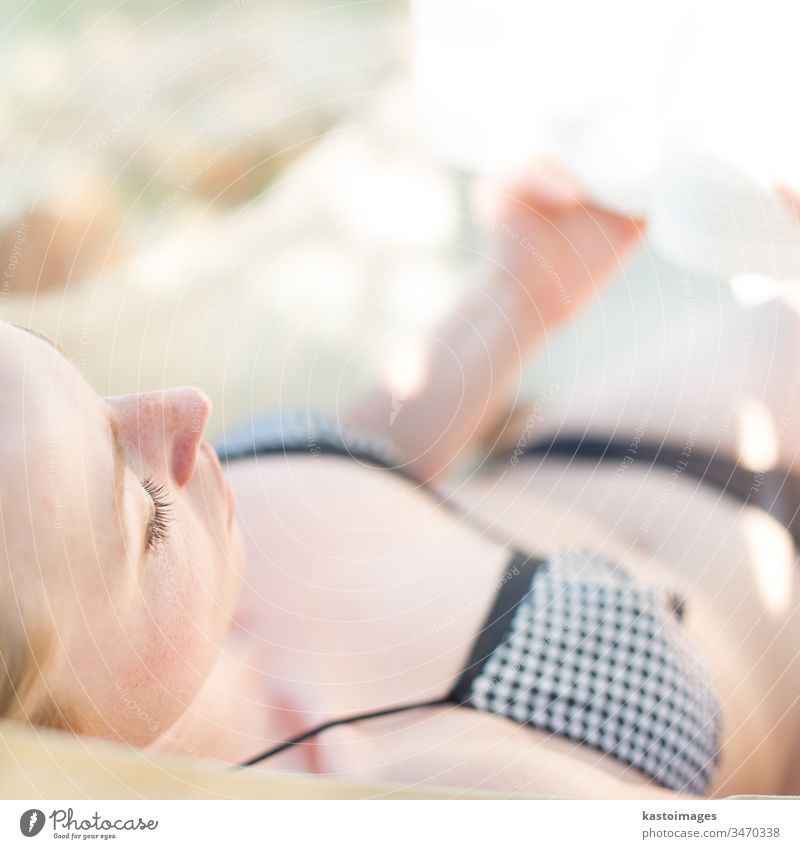 Lady reading a book in hammock. adorable attractive beach beautiful beauty bikini blonde blue body caucasian closeup education face female girl happy healthy