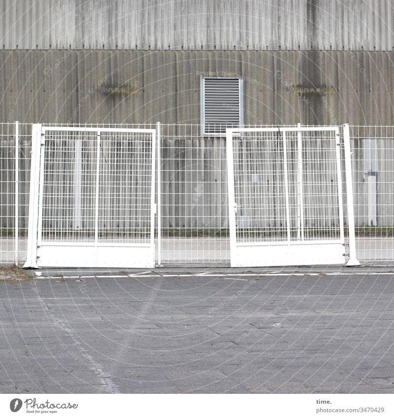 Stories from the fence (69) Fence Building Grating cordon locked too Gray Metal Places Stone Concrete Ventilation Corrugated sheet iron Gloomy boringly