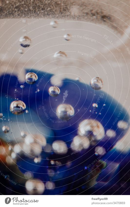 Abstract texture of bubbles captured in glass abstract blue white macro retro background copy space copyspace air water contrast freshness condensation