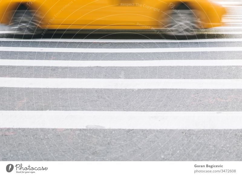 Abstract blur of urban street scene with a yellow taxi cab in New York, United States america american broadway business busy car city commercial manhattan