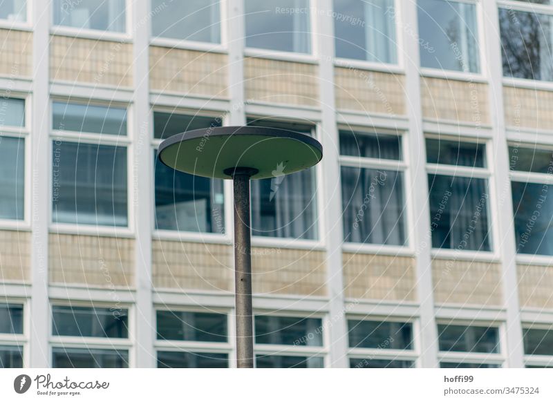 Lamp in front of skyscraper facade Street lighting Gloomy Lamp post dreariness Lantern minimalism urban Minimalistic Building Facade Line Structures and shapes