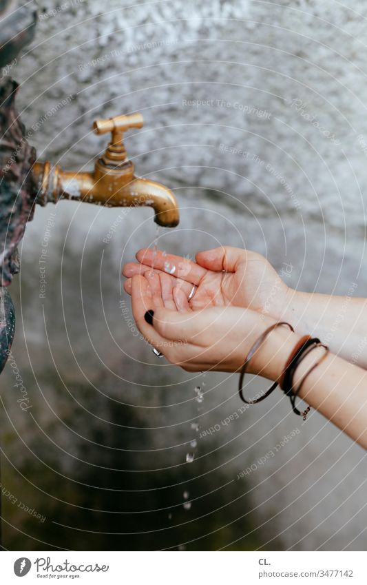 woman washes her hands Water Tap Well Clean hygiene Woman neat Wash hands care Cleanliness Hand Drops of water out