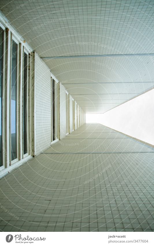 in a corner with lots of shadow and light above tiles Wall (building) Building Tower block Modern Worm's-eye view Shadow Sharp-edged Beige High-rise beige-brown