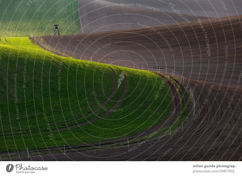 Rural landscape of Turiec region in northern Slovakia. countryside rural fields spring agriculture nature hunting lookout rolling hills eveningÍ