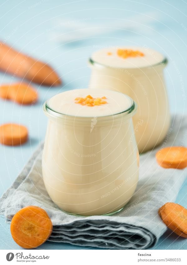 Yogurt with carrot, copy space vegetable yogurt smoothie berry milkshake food juice view background glass dark cocktail red dairy jar healthy blended drink