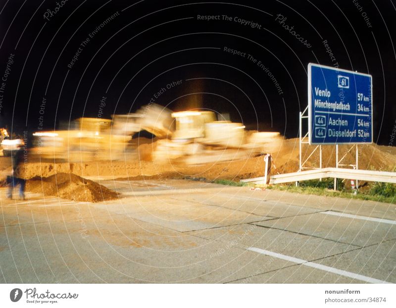 Excavatorcrossing A61 - 2004 - 1 Highway Rhine-Westfalia Electricity Works AG Lignite Night Long exposure Transport bulldozer Sand motorway closure