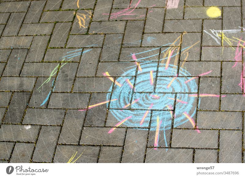 Chalk drawing of Coronavirus on a footpath Children's drawing Childlike Street art variegated Footpath Virus coronavirus risk of contagion Infection