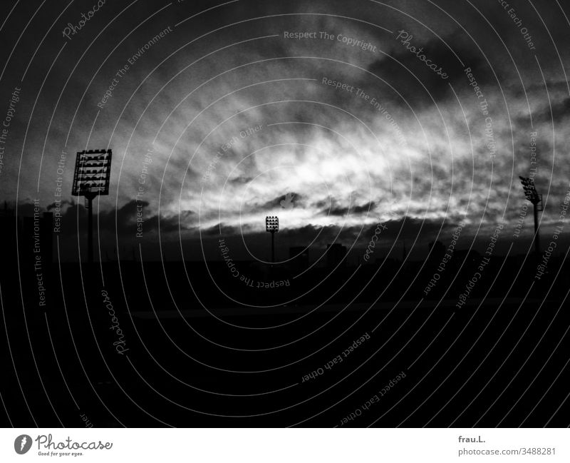 Mischief had descended upon the football stadium, even the ghost fans had left. Stadium St. Pauli Town Clouds Exterior shot Hamburg Foot ball Deserted Evening