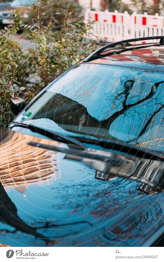 reflections on a car Car Vehicle Means of transport Abstract abstraction Tree Building Window pane Car Window complexity Reflection Colour photo Deserted