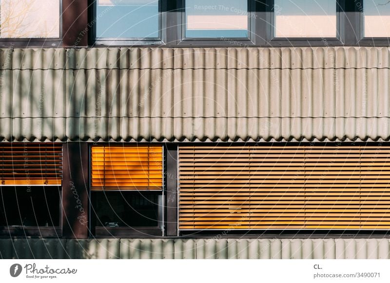 façade Window Roller blind Yellow Facade Screening Venetian blinds House (Residential Structure) Roller shutter Closed Wall (building) built Office building