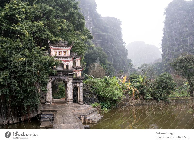 Entrance to a temple complex in Ninh Binh, Vietnam Environment Trip Plant Far-off places Colour photo mountains Nature Exterior shot Mountain Adventure Tourism