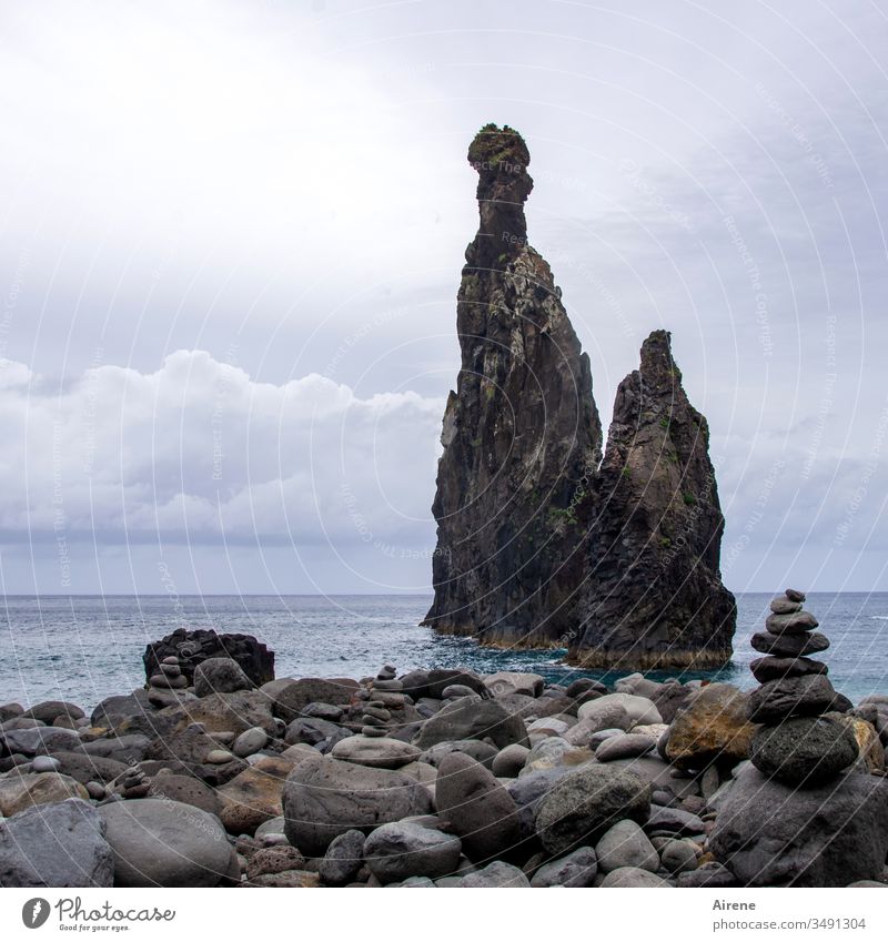 father, mother, child Rock Ocean Steep Island Madeira rock needles cliffs Stony Coast Sky Blue Water Pebble beach turquoise Impressive Prongs Climbing