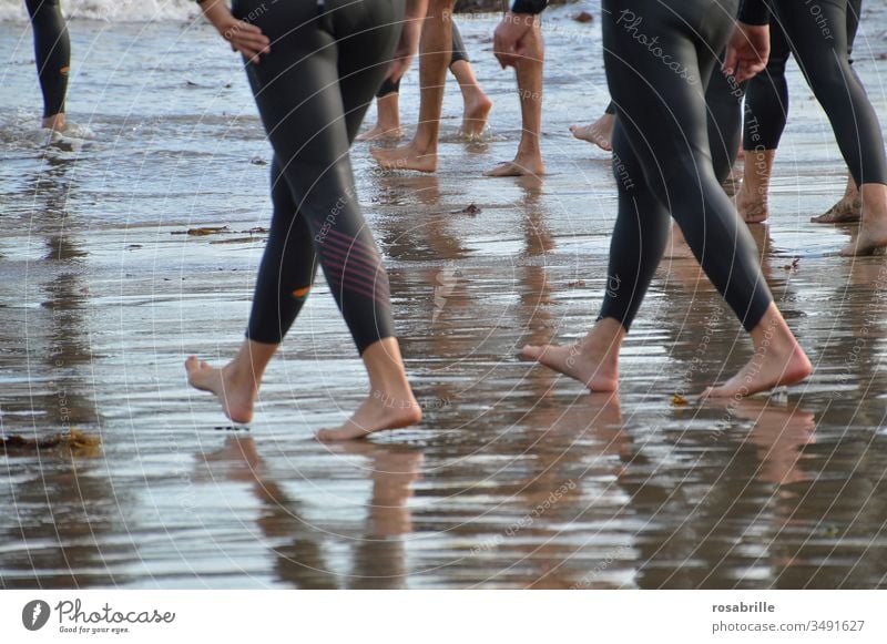 the | sound | of splashing water when many feet run in at the same time ... Water sports for health Sports Aquatics Many Walking Beach Sand Wetsuit Barefoot