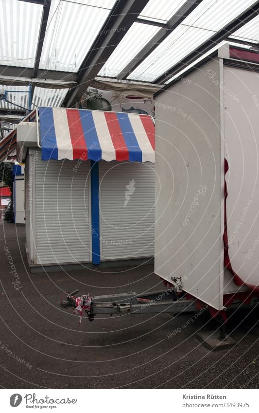 closed market stalls Markets market stands Market stall booths Marketplace Closed too closure Roller shutter roller shutter shutters Sun blind Red White Blue