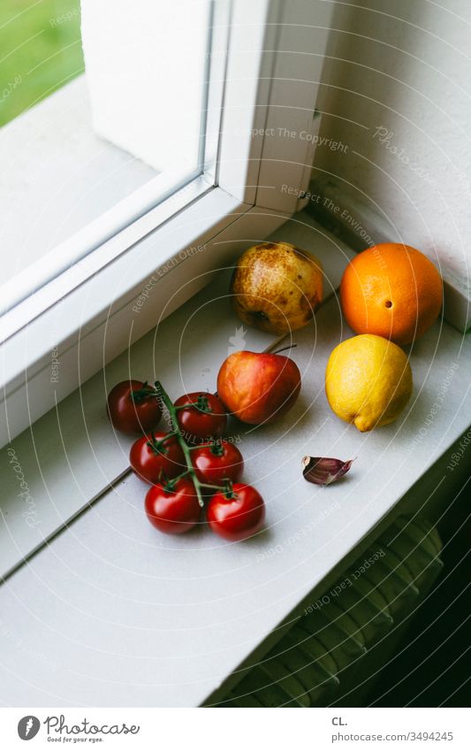 fruit on windowsill Lemon Apple Orange Tomato salubriously Delicious Eating vitamins Window Healthy Food Nutrition Natural Vegetarian diet Interior shot