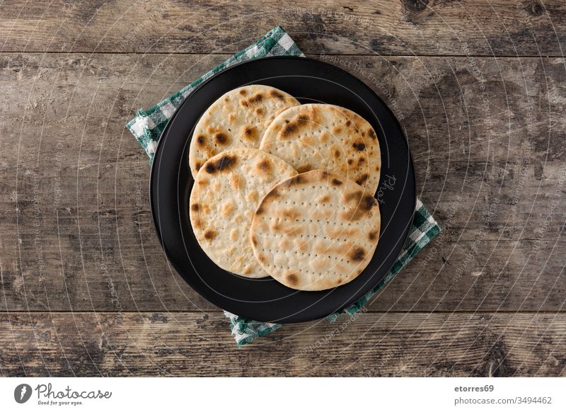 Handmade matzah for Jewish Passover on wooden table. Top view background baked bread celebration culture dough food handmade hebrew holiday homemade israel