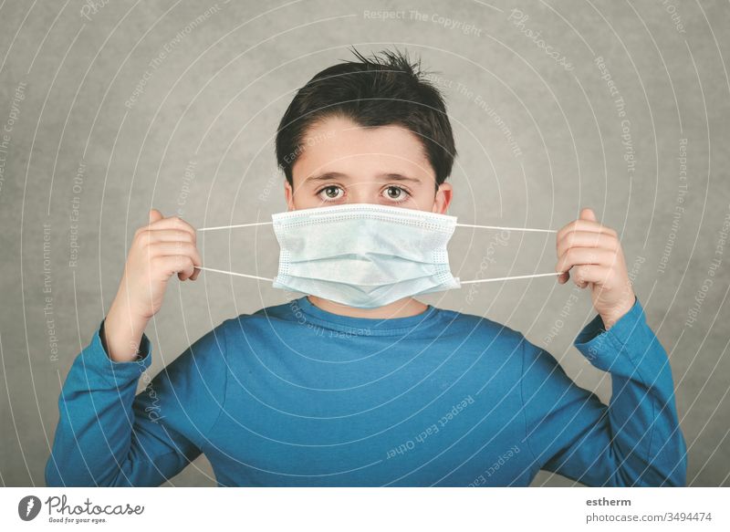 Coronavirus,Child wearing medical mask coronavirus child epidemic pandemic quarantine covid-19 symptom medicine health childhood positive test hospital gesture