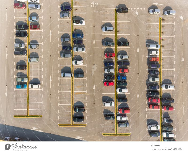 Cars on parking car vehicle row lot asphalt transport road view automobile garage urban transportation public street background traffic line nobody cars outside