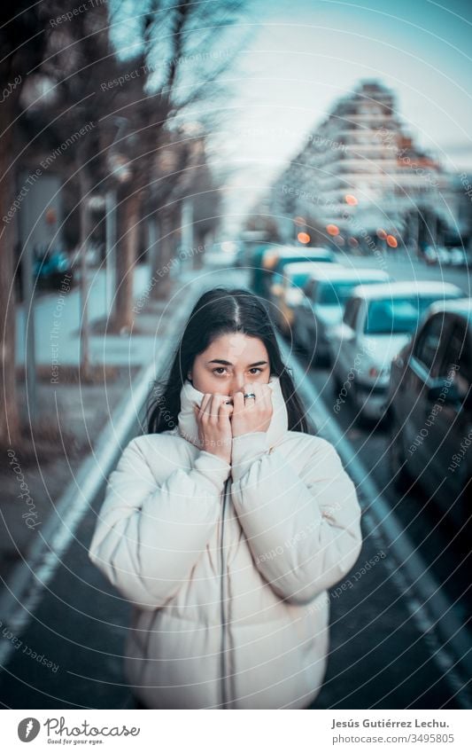 Young woman in a white coat in the middle of a road with great blur Life Colour photo people Exterior shot Model Beautiful Cute Beauty Photography sweet girl