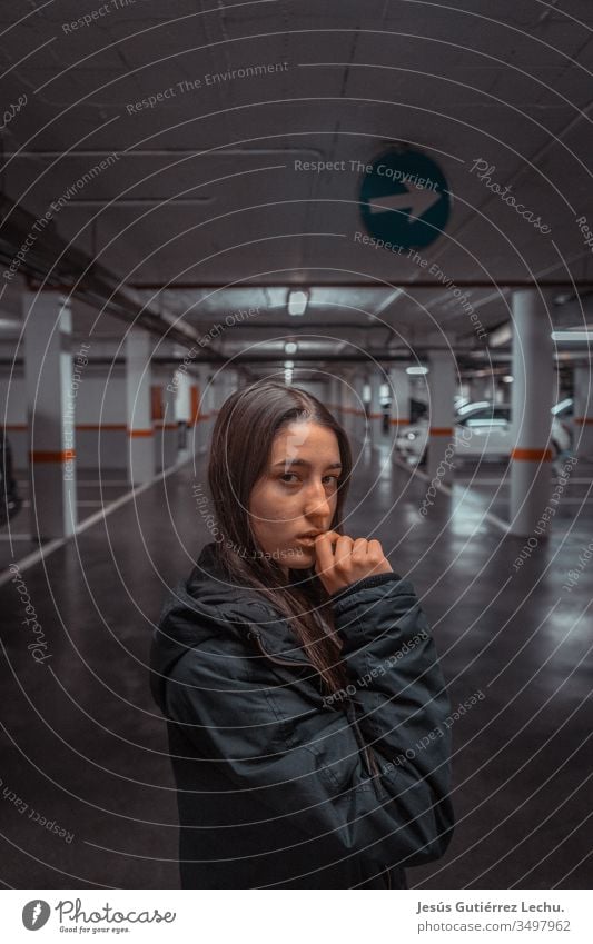 young girl in a garage vintage background hair Face people Exterior shot Beauty Photography attractive Lifestyle Caucasian sweet girl Street Travel photography