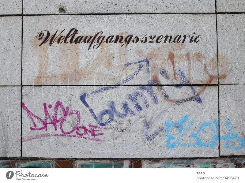 Facade with the inscription Weltaufgangsszenario Letters (alphabet) Gray Wall (building) Sign Wall (barrier) Copy Space bottom lettering Graffiti Characters