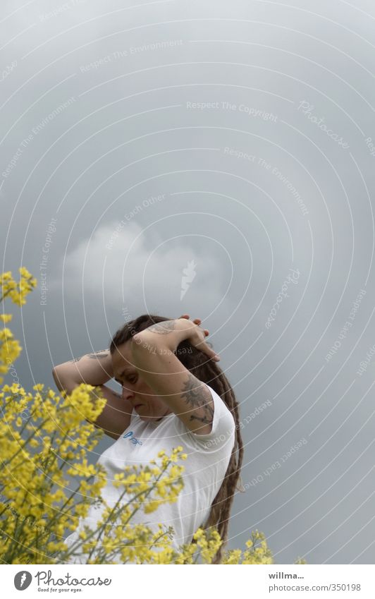 Reflect. Finding inner peace. In the rapeseed field. Youth (Young adults) reflection rastas Spring Canola Dreadlocks Think Relaxation To enjoy Emotions Calm