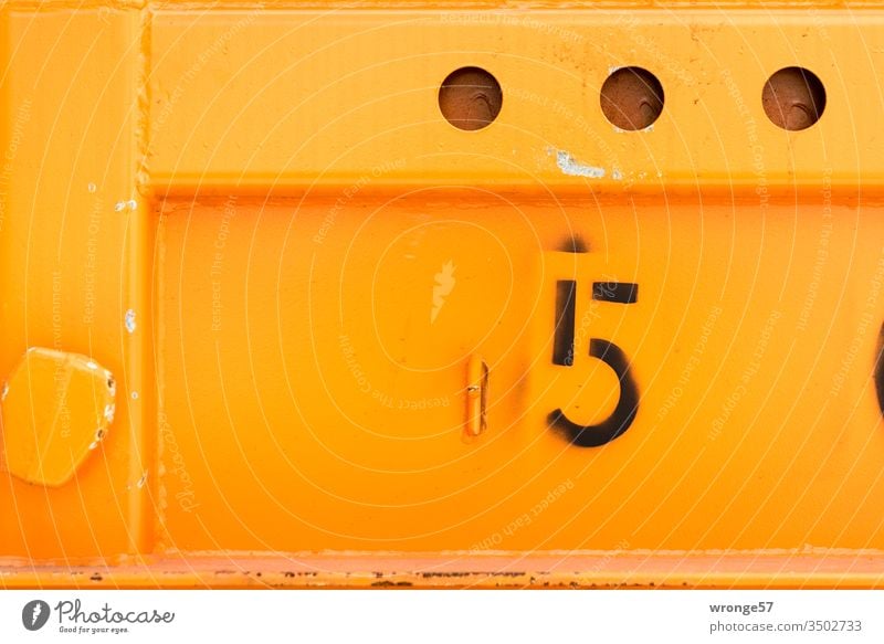 Number 5 - Digit on the wall of an orange container number Digits and numbers Colour photo Deserted Exterior shot Signs and labeling Detail Container