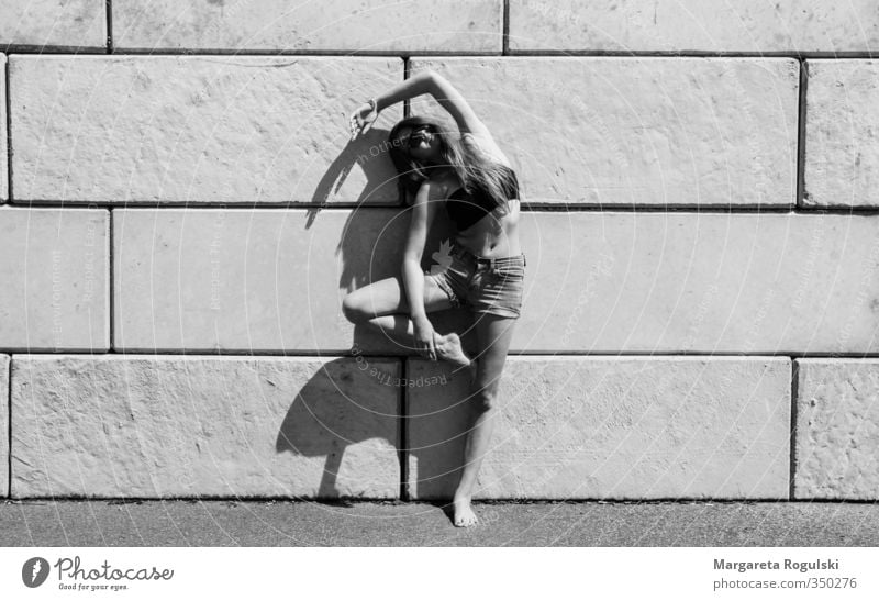 stand Black & white photo Wall (barrier) Woman Bend Stand Dance Yoga Stone Concrete Shadow Sun Middle Fashion