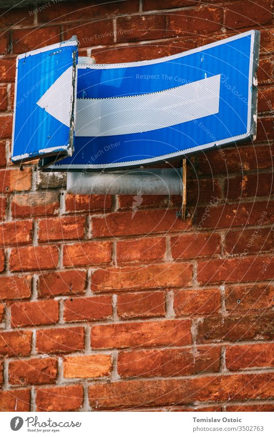 Broken street sign wall texture brick color contrast Wall (building) Brick Brick wall Colour photo Exterior shot Day Old symbolic Symbols and metaphors Funny