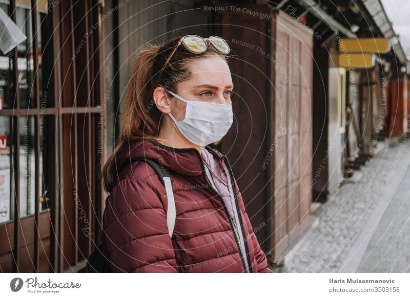 Woman business owner in front of her closed shop due to coronavirs covid-19 restriction abandoned architecture asia blue building bus station carsija city