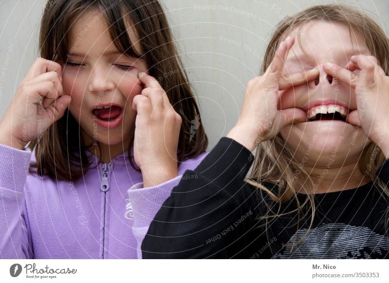 make faces Grimace grimace Brash Funny Happiness Snapshot Fingers Infancy fun Face portrait Facial expression Crazy girl Easygoing Teeth girlfriends Joy