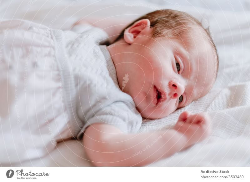 Sleeping newborn baby on black background sleep little child tiny peaceful innocent cute tranquil infant adorable serene tender lying childhood calm kid healthy