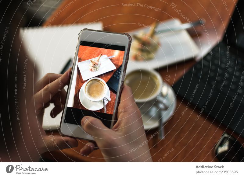 Crop guy taking photo of coffee and salad man take photo cafe young lunch smartphone modern social media male shoot capture memory moment food delicious cup