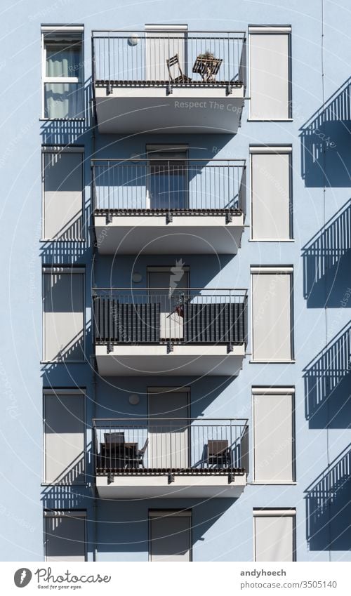 Blue new building with shutters and balconies apartment architectural architecture balcony block blue bright city cityscape concrete construction contemporary