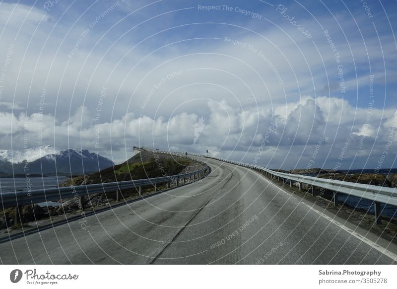 Atlantic road deserted on a cloudy day with mountains in the background Atlantic Ocean Norway Atlanterhavsveien Northern Europe Scandinavia Street Street art