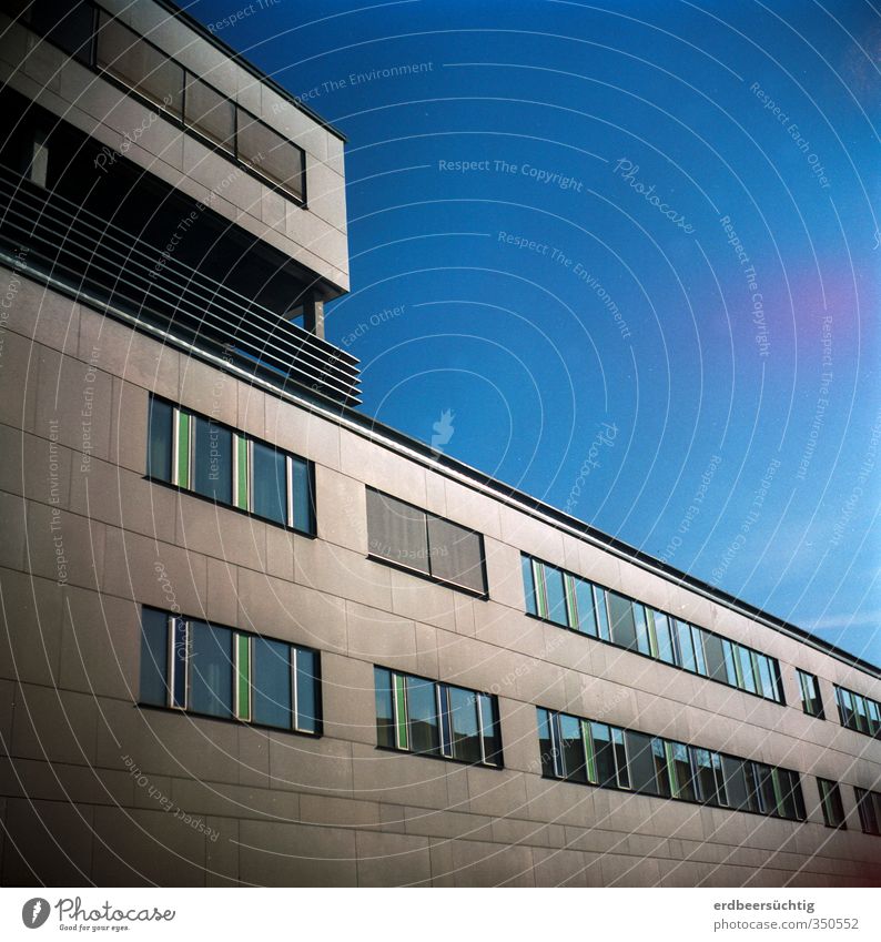 escape into the blue Cloudless sky Town Deserted House (Residential Structure) Building Architecture Facade Window Concrete Glass Blue Calm Business Future