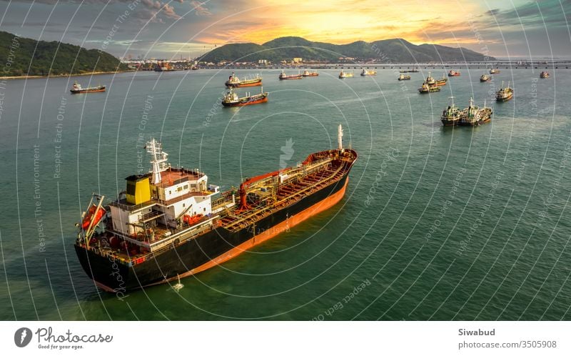 Aerial view oil and gas petrochemical tanker offshore in open sea, Refinery industry cargo ship, Oil product tanker and LPG tanker at sea view from above, Aerial view oil tanker ship vessel.