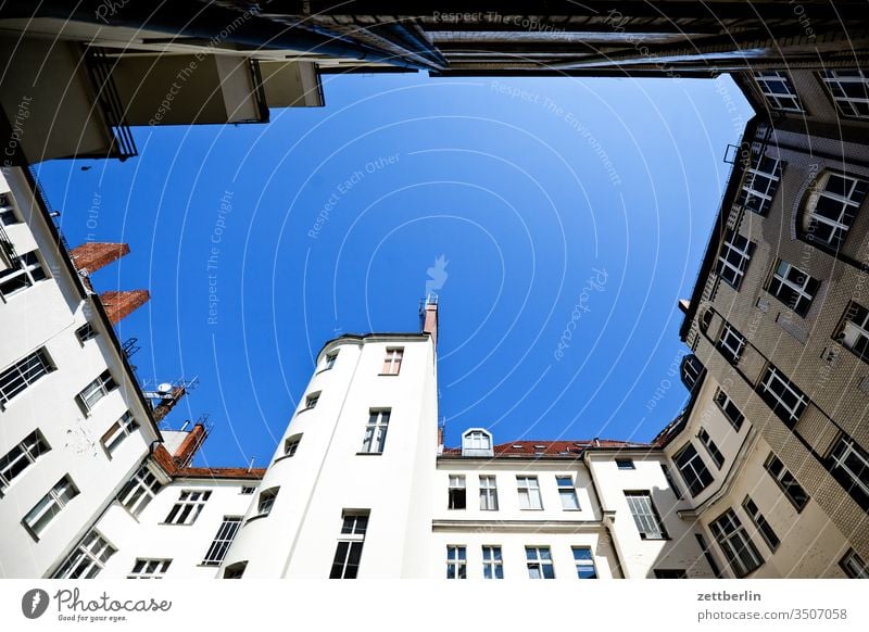 Backyard in Moabit Old building on the outside Fire wall Facade Window House (Residential Structure) Sky Sky blue rear building Courtyard Interior courtyard