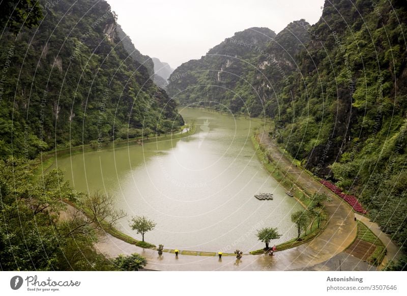 Lake Tuyet Tinh Coc near Ninh Binh, Vietnam Nature Landscape mountains Steep Green Water off circular trail Valley Asia Exterior shot Vacation & Travel Culture