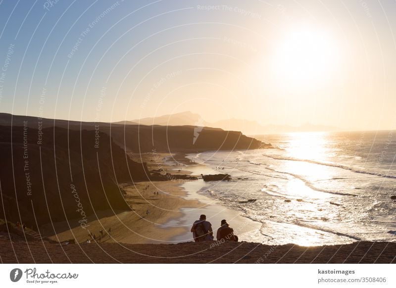 Pared beach, Fuerteventura, Canary Islands, Spain La Pared couple romantic view landscape sunset water nature sea ocean travel background surf wave sand summer