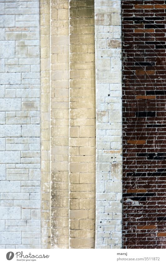 passageway bricked, with different edges and colours Wall (building) stonewalled Stone Stone wall Subdued colour Facade Structures and shapes Pattern Abstract