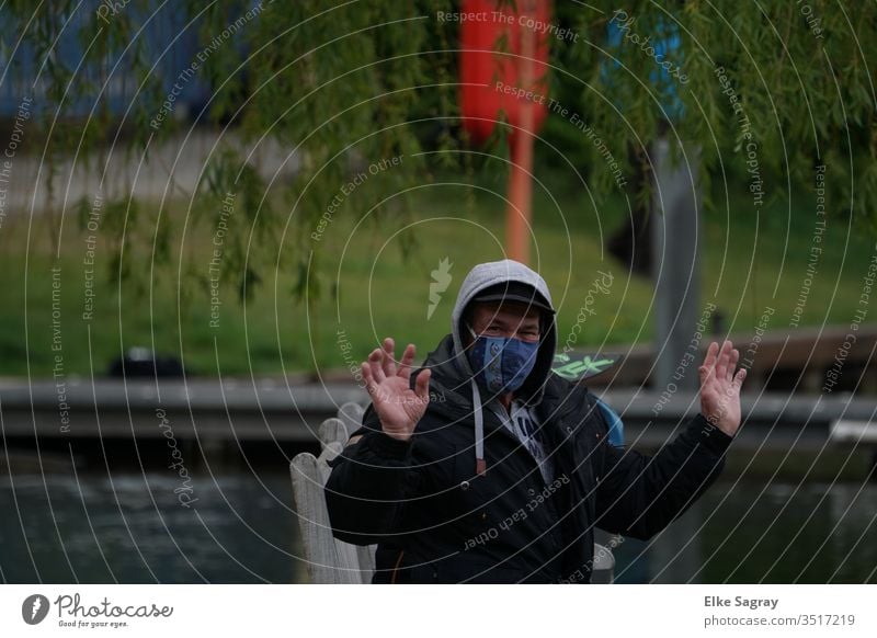 Man with mask Exterior shot Adults Human being Senior citizen Male senior 60 years and older Authentic