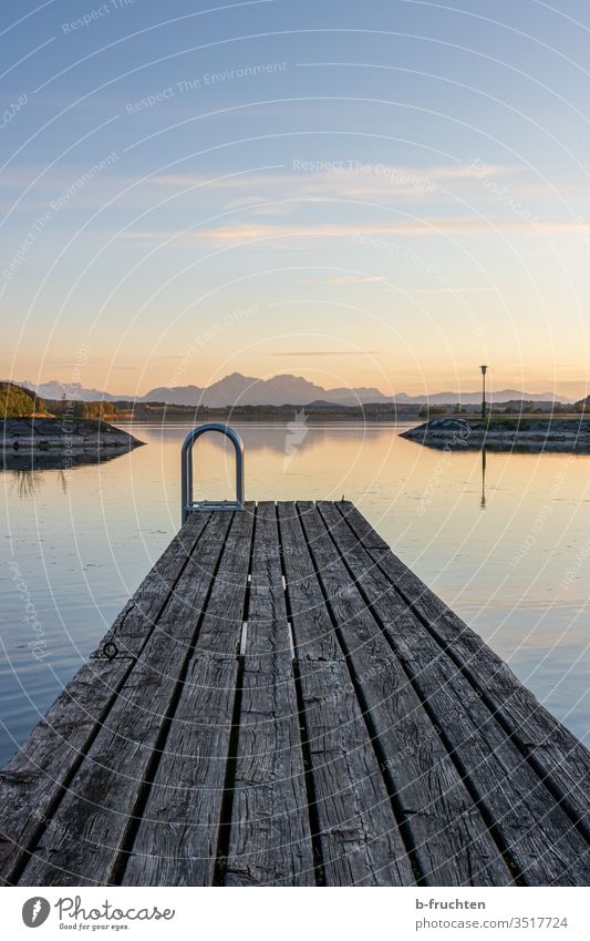 Small wooden jetty at the lake Sunset Dusk evening mood Clouds Sky Horizon Twilight Evening Landscape Nature Lake Footbridge Alps Austria Calm Water Deserted