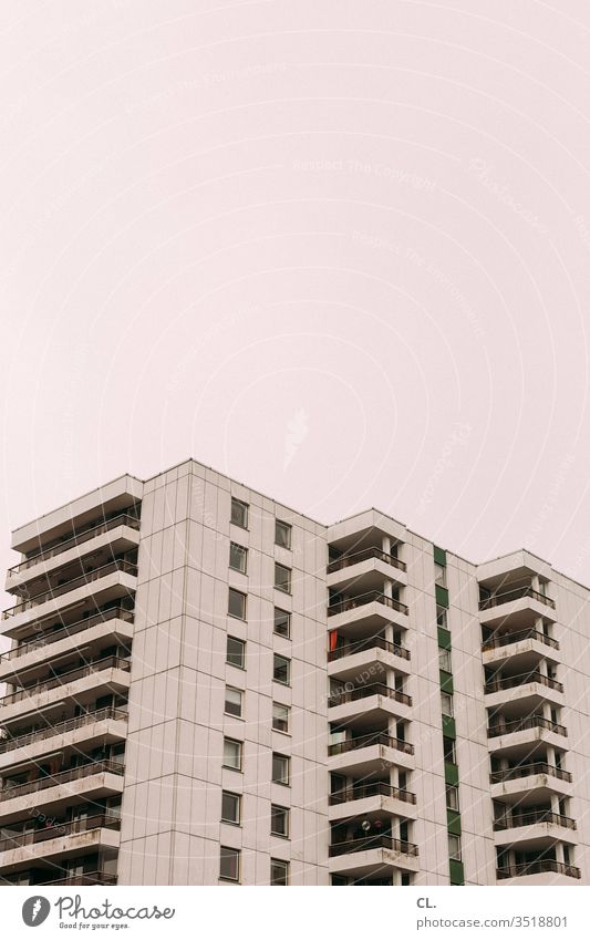 skyscraper High-rise Facade Sky urban Town Architecture built Anonymous Prefab construction dwell Balcony Gloomy Tall Colour photo Deserted Exterior shot