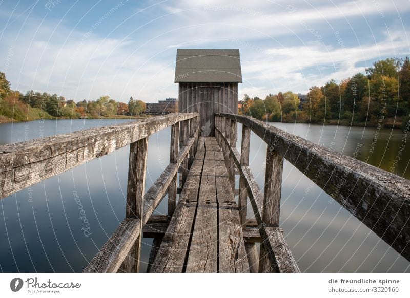 Lift in the Harz Mountains Hahnenklee Lake Long exposure Symmetry huts Autumn Sky Blue colourful Nature Landscape green tree Exterior shot Water Forest Deserted