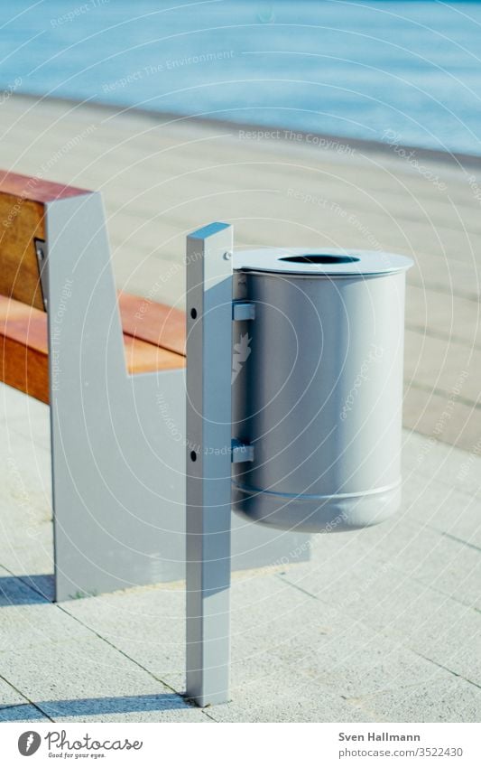 Waste bin next to bench Trash container Colour photo Deserted Environment Environmental protection green Town Recycling Exterior shot Arrangement