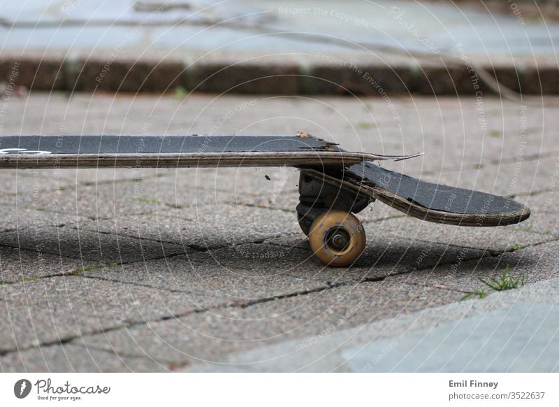 Broken Skateboard Light Day Neutral Background Detail Abstract Experimental Skateboarding Esthetic Work of art Skate store Extreme sports Colour photo Air skate