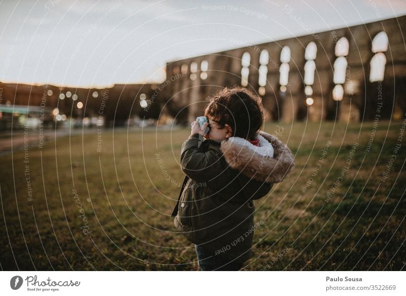 Child taking picture on sunset Camera taking photo Photography Technology Sunset Caucasian childhood Exterior shot Vacation & Travel Lifestyle Tourist Happiness