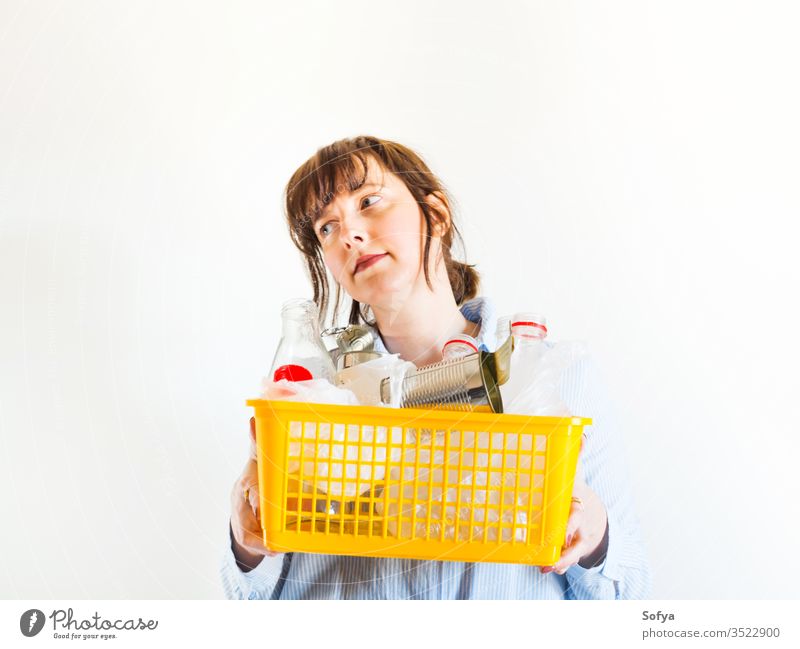 Caucasian woman with trash ready for recycling recycle environment plastic environmental sustainable sort disposal female bin ecology waste holding garbage