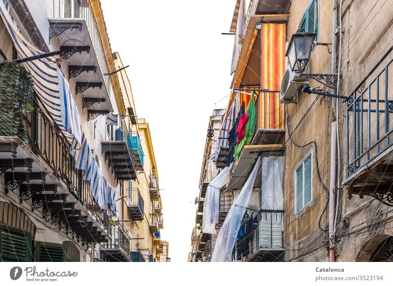 A cloudy balcony landscape Balcony Architecture House (Residential Structure) Building Facade Window Manmade structures Living or residing Town Sky